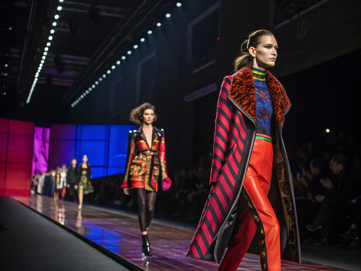 A stylish photograph from a Maison De La fashion show, featuring avant-garde designs, diverse models, and a cutting-edge aesthetic.